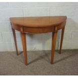 A pair of George III style demi lune console tables, 20th century, each with a central fan inlay and