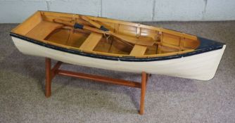 A scale model of a clinker built rowing boat, 116cm long