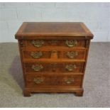 A George I style burr walnut veneered Batchelor's chest, 20th century reproduction, of typical small