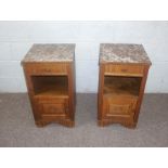 A pair of Art Deco oak bedside cabinets, with Rosso Antico stone tops, over a single drawer, book