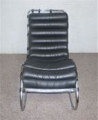 An Italian design reclining chair, 20th century, with chromed tubular metal cantilevered frame,