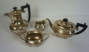 A four silver teaset, hallmarked Birmingham, 1923, comprising a teapot of waisted oval form, a
