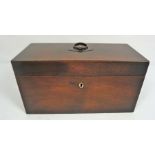 A George III mahogany tea caddy, with two internal lidded cannisters and a well for a mixing bowl (