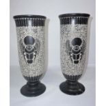Egyptian School, 20th century Contemporary, A pair of relief carved Basalt vases, decorated with