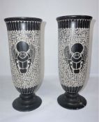 Egyptian School, 20th century Contemporary, A pair of relief carved Basalt vases, decorated with