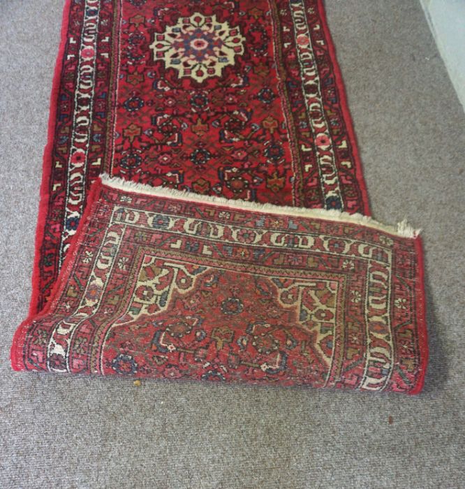 Three rugs, including a Caucasian wool runner, modern, 310cm x 84cm (3) - Image 4 of 11