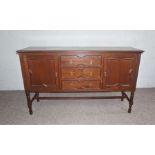 A modern beech dresser, 20th century, with three drawers and two cabinet doors, 100cm high, 188cm