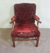 A 19th century mahogany armchair, with scrolled arms and square section legs (upholstery