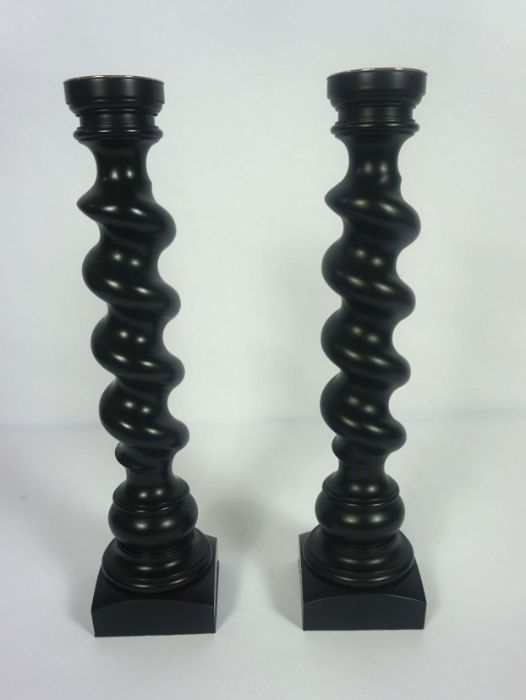 A pair of Linley twist column candlesticks, with white metal sockets, by David Linlay, with ebonized