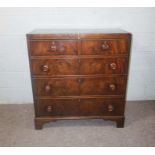 A Victorian mahogany chest of drawers, circa 1840, with two short and three long drawers, on bracket