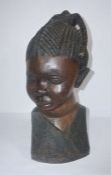 A large African hardwood portrait bust of an 'African Princess', 62cm high, bought by the vendor