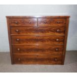 A large Victorian mahogany chest of drawers, circa 1860, with two short and four long drawers (