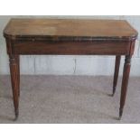 A Regency mahogany tea table, circa 1820, with rounded rectangular fold over top and set on four