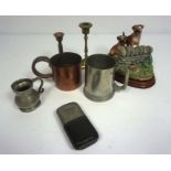 A miscellany of objects, including a pewter tot measure, a half pint copper measure, small hop