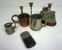 A miscellany of objects, including a pewter tot measure, a half pint copper measure, small hop