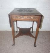 A small George III style carved mahogany sofa table, with drop leaf sides, a single drawer and plain