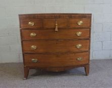 A George IV mahogany bowfront chest of drawers, early 19th century, with three small drawers and