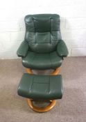 A modern Ekornes green leather 'Stressless' easy chair and matching foot stool, the chair 101cm
