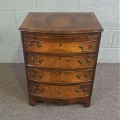 A small walnut veneered bedside chest of drawers; together with a 19th century drop leaf table;