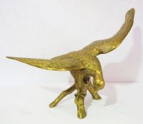 A modern brass statue of an eagle, with wings spread, 46cm high, 60cm high