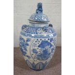 A large Chinese blue and white floor standing vase and cover, modern 20th century, ovoid with panels