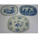 Three large blue and white meat drainers, 19th century, including a fine ovoid example decorated