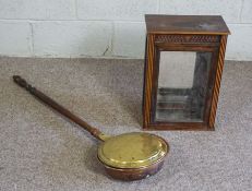 A 19th century brass and turned wood bed pan, 108cm long; together with a small glass Smokers