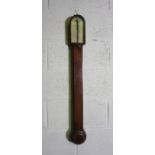 A George III mahogany cased stick barometer, signed F.W.Field, Aylesbury, with a silvered dial
