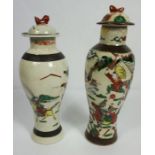Two Chinese stoneware baluster vases, Qing Dynasty, 19th century, with covers, both decorated in