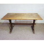 A modern oak refectory style dining table, 76cm high, 152cm long