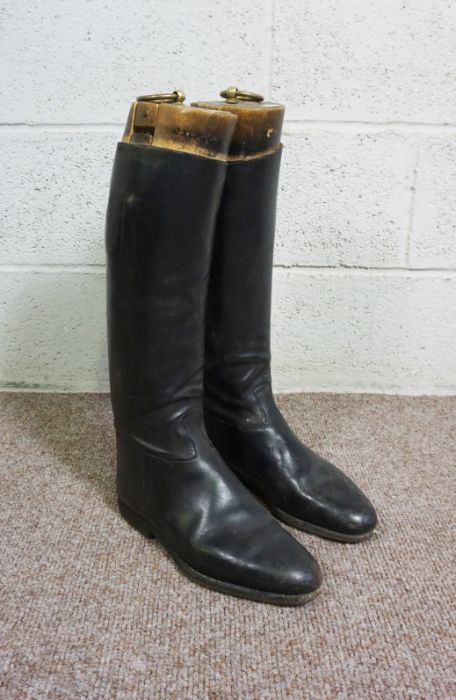 A pair of vintage black leather riding boots by Maxwell of London, with trees, approx size 10 (