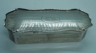 A silver trinket or pin box, Elkington & Co, Birmingham 1904, 12cm long; together with a group of