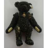 A Steiff miniature 'Titanic - Mourning Bear - 1912', replica, metal alloy with articulated limbs and