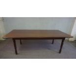 A large modern 'mahogany' dining table, 20th century, with a rounded rectangular top on four