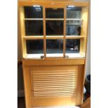 A modern cherry veneered Jewellers shop display cabinet, with a glazed top, fitted with shelves
