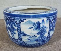 A blue and white floral footbath, 55cm wide; together with a Chinese blue and white garden fish