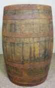 A traditional Sherry or Whisky cask, with iron hoop bands, 90cm long, 64cm diameter