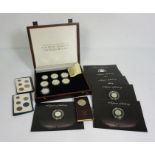 A small group of Royal Mint collectors coins, including a cased set of H.M. The Queen Elizabeth, The