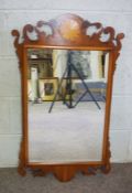 A George III style fretwork wall mirror, with inlays, 90cm x 50cm; together with two other modern
