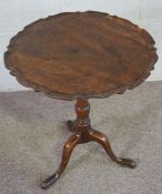 A George III mahogany wine table, with scalloped circular tilt top on tripod base, 74cm high, 60cm