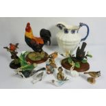 A selection of ceramics, including a large decorative cockerell, assorted other bird figurines, a