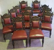 A set of twelve Jacobean revival Victorian oak dining chairs, circa 1880, including two large