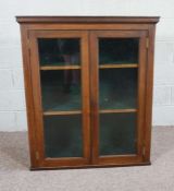 A 19th century glazed bookcase top, 112cm high, 95cm wide