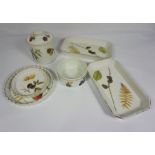 A pair of Royal Worcester fireproof oven dishes, decorated with Autumn leaves, together with a