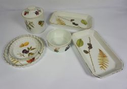A pair of Royal Worcester fireproof oven dishes, decorated with Autumn leaves, together with a