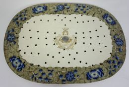A rare Copeland blue and white meat drainer, 19th century, centred with a crowned figure and the
