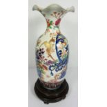 A large Chinese Imari porcelain baluster vase, Qing Dynasty, decorated with a Dragon and Lyre Bird