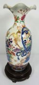 A large Chinese Imari porcelain baluster vase, Qing Dynasty, decorated with a Dragon and Lyre Bird