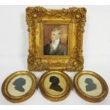 A set of three 19th century silhouettes, each depicting the head of a lady, in oval gilt frames,
