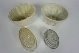 A group of assorted ceramics and glass, including four jelly moulds, a large Staffordshire meat